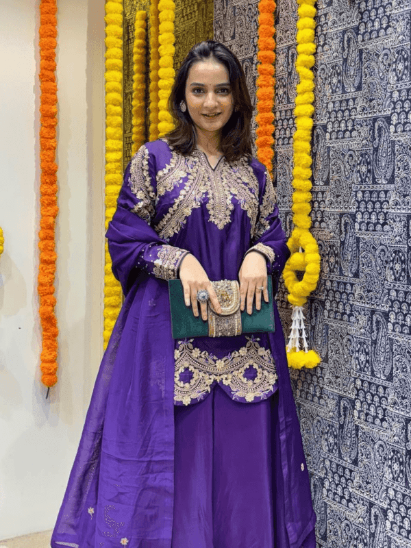 Graceful heavy Chinon silk top with embroidery, rivet moti, and latkan details, paired with a matching plazzo and elegant dupatta, perfect for festive and party wear.