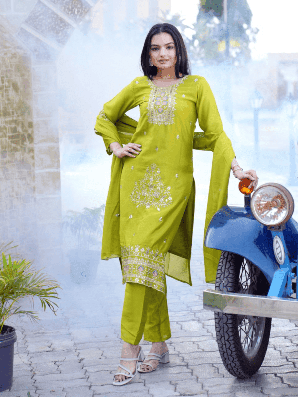 Designer Chinon suit featuring intricate embroidery and 5mm sequins. Comes with a soft micro inner, elastic-stitched pants, and a beautifully embroidered dupatta.