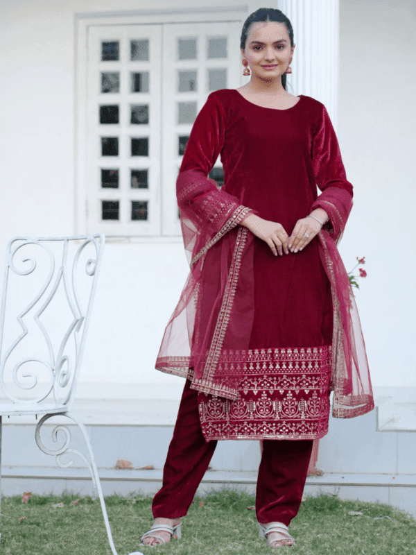 Heavy Velvet Suit with Sequence Embroidery and Net Dupatta.