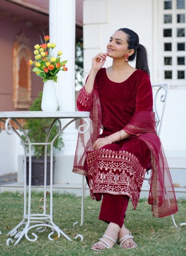 Heavy Velvet Suit with Sequence Embroidery and Net Dupatta.