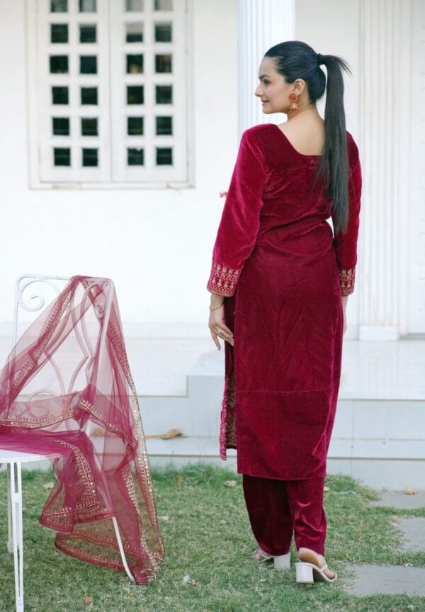 Heavy Velvet Suit with Sequence Embroidery and Net Dupatta.