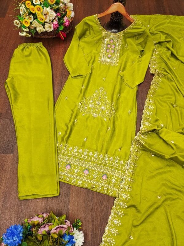 Designer Chinon suit featuring intricate embroidery and 5mm sequins. Comes with a soft micro inner, elastic-stitched pants, and a beautifully embroidered dupatta.