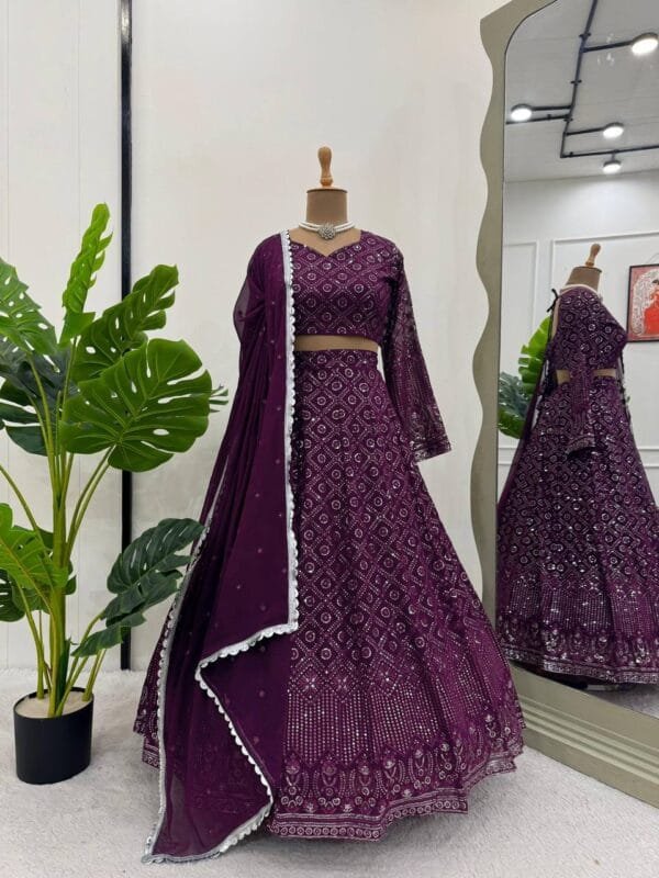 A stunning Faux Georgette Lehenga Set with delicate thread and sequin embroidery, a voluminous cancan design, and an elegantly bordered dupatta. Perfect for special occasions.