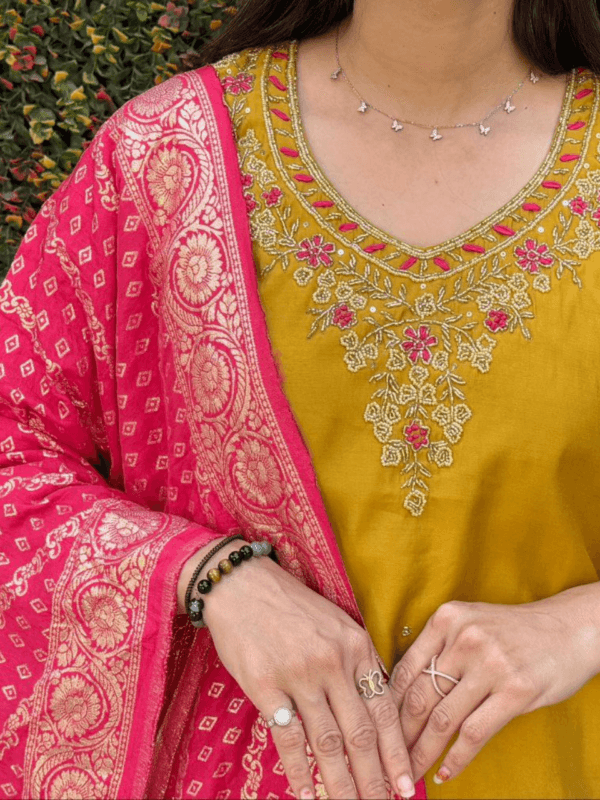 Yellow Roman Silk Kurti Set with Handwork and Jacquard Dupatta.