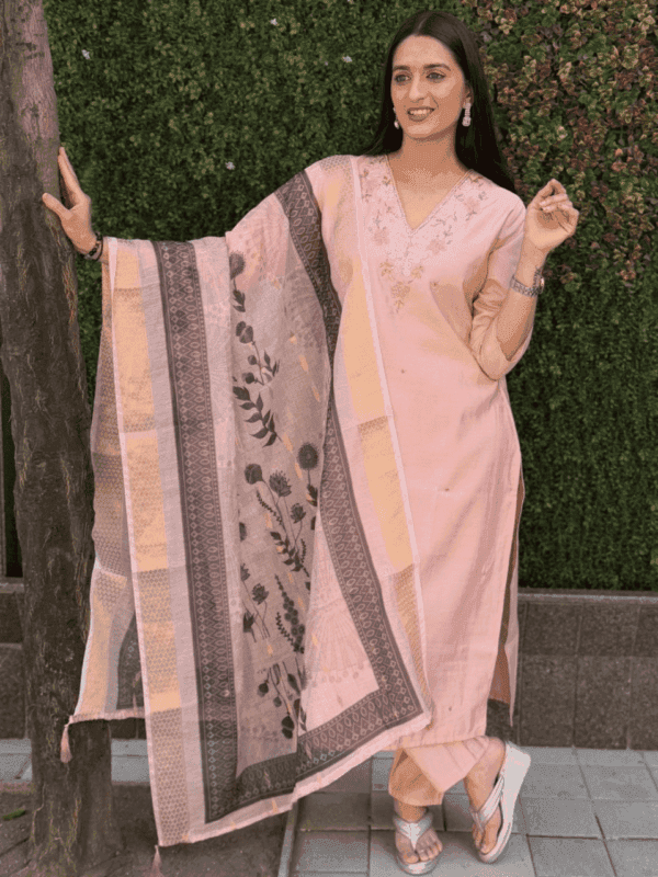 The Designer Peach Kurti Pent Dupatta Set made from Premium Roman Silk features hand work, a digital print dupatta, and a cotton inner, making it ideal for festive occasions.