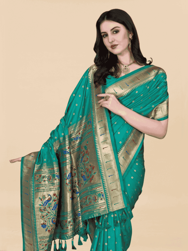 Soft Pethani silk saree with golden zari weaving, motifs, and designer silk blouse piece, perfect for traditional and festive wear.