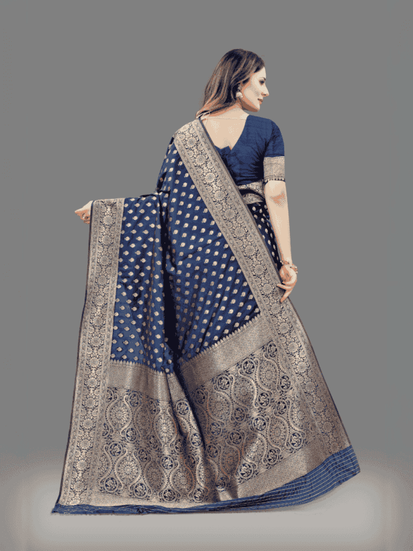 Soft Lichi silk saree with golden zari weaving, intricate motifs, and designer silk blouse piece, perfect for traditional wear.