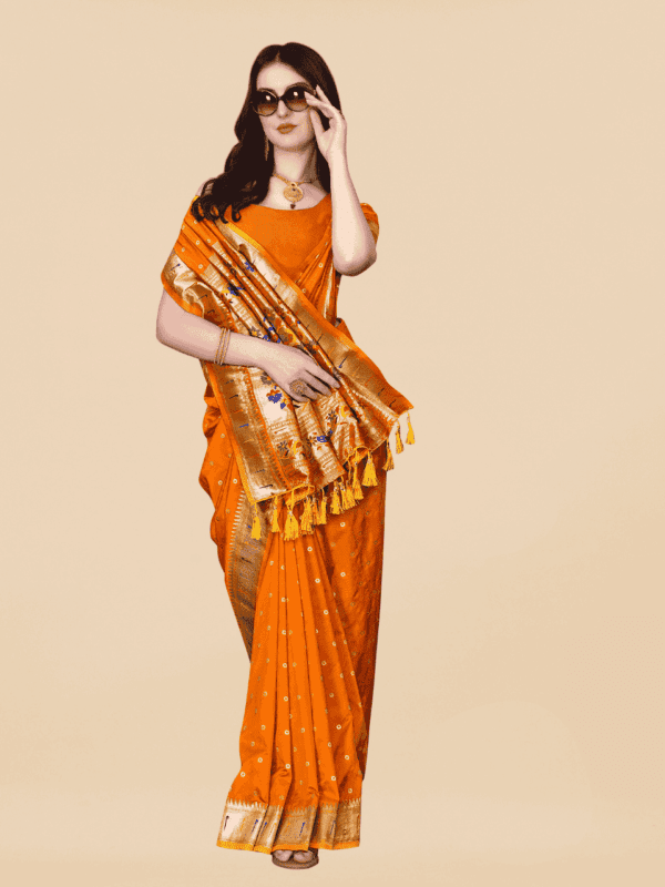 Soft Pethani silk saree with golden zari weaving, motifs, and designer silk blouse piece, perfect for traditional and festive wear.