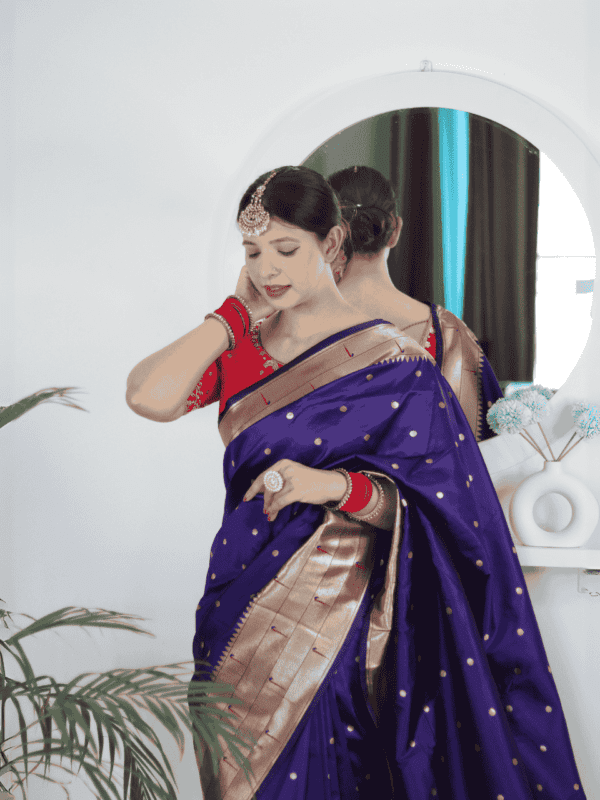 Soft Paithani silk saree with Meenakari zari weaving, tassels on the pallu, and designer silk blouse piece, ideal for festive traditional wear.