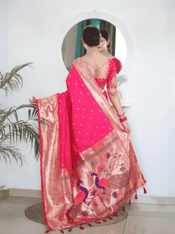 Soft Paithani silk saree with Meenakari zari weaving, tassels on the pallu, and designer silk blouse piece, ideal for festive traditional wear.