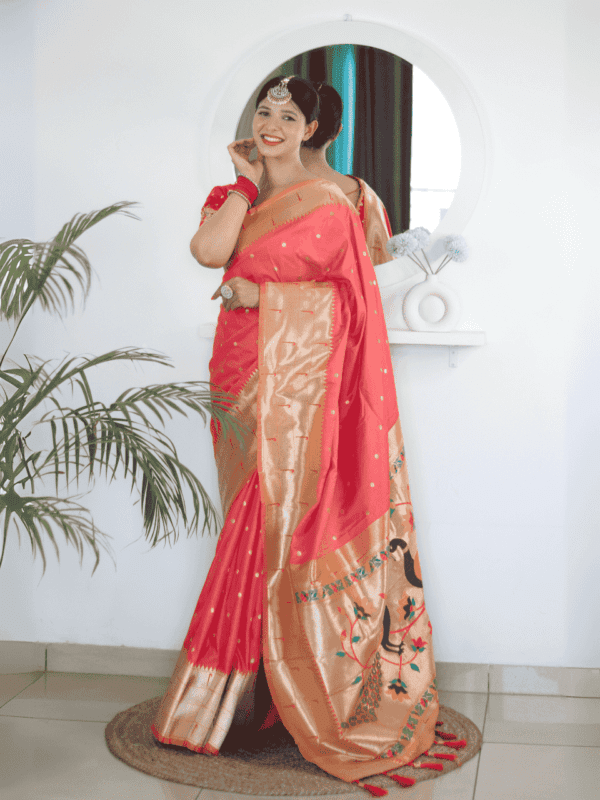 Soft Paithani silk saree with Meenakari zari weaving, tassels on the pallu, and designer silk blouse piece, ideal for festive traditional wear.