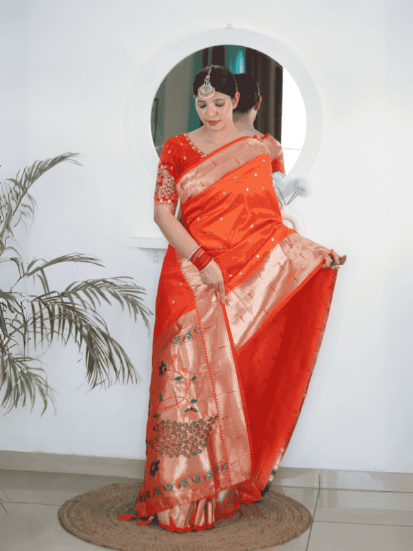 Soft Paithani silk saree with Meenakari zari weaving, tassels on the pallu, and designer silk blouse piece, ideal for festive traditional wear.