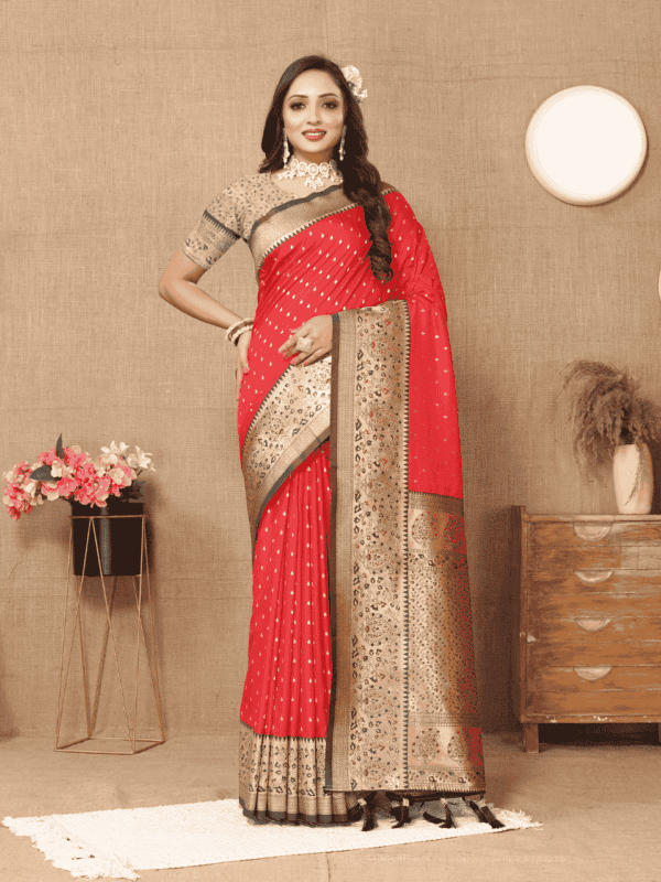 Elegant soft silk saree with detailed zari weaving, contrast pallu border, tassels at the end, and a brocade silk blouse piece, perfect for special occasions.