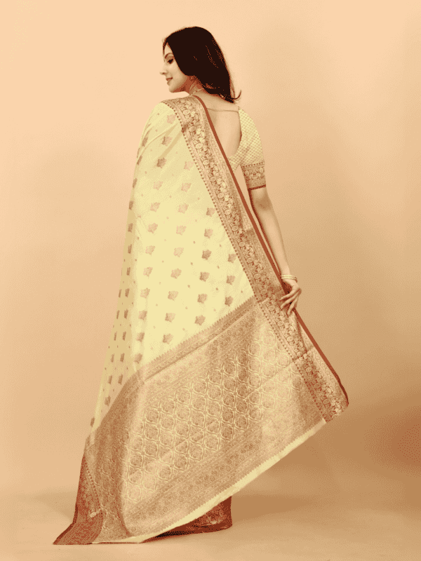 Soft magic slub silk saree with golden zari woven pallu, intricate motifs, and a designer silk weaving blouse piece.