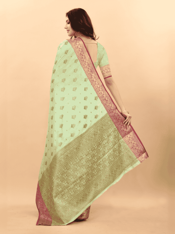 Soft magic slub silk saree with golden zari woven pallu, intricate motifs, and a designer silk weaving blouse piece.