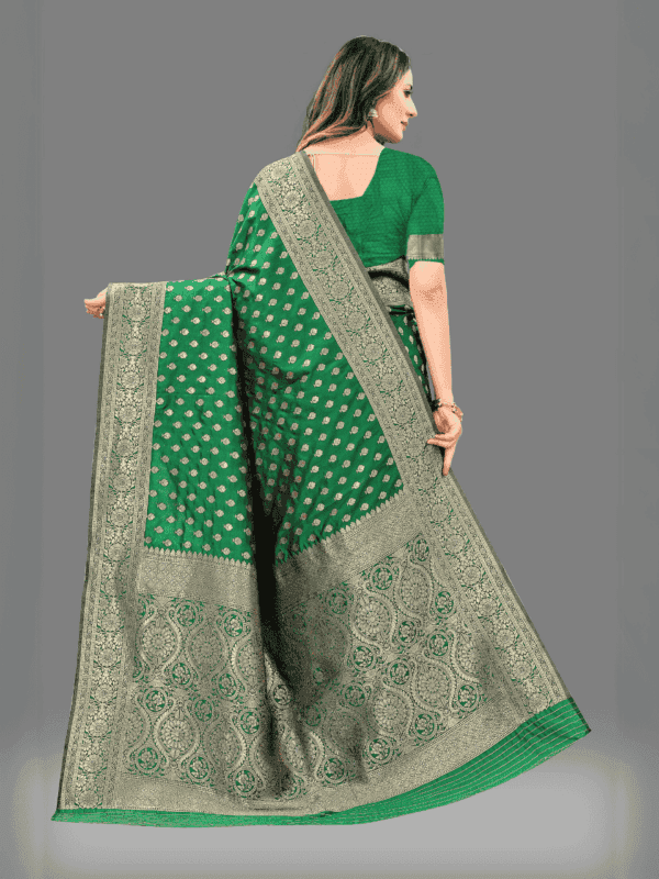 Soft Lichi silk saree with golden zari weaving, intricate motifs, and designer silk blouse piece, perfect for traditional wear.