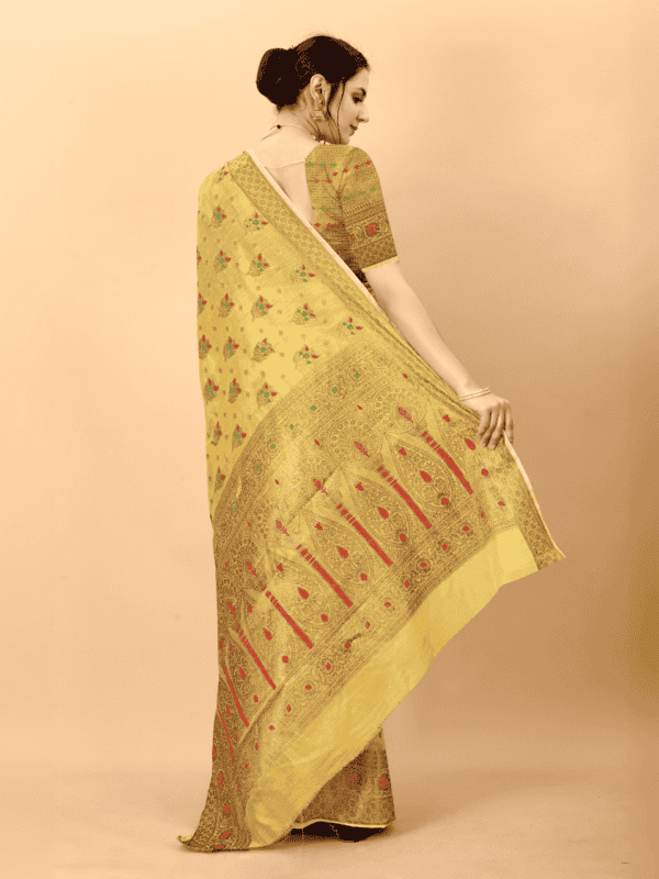 Soft cotton silk saree with golden zari woven pallu, detailed motifs, and a designer silk weaving blouse piece.