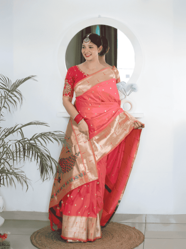 Soft Paithani silk saree with Meenakari zari weaving, tassels on the pallu, and designer silk blouse piece, ideal for festive traditional wear.