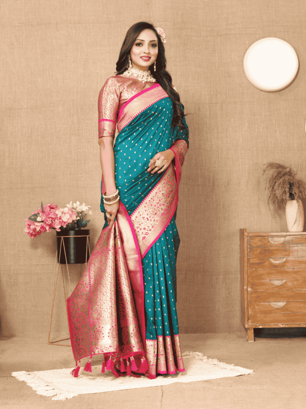 Elegant soft silk saree with detailed zari weaving, contrast pallu border, tassels at the end, and a brocade silk blouse piece, perfect for special occasions.