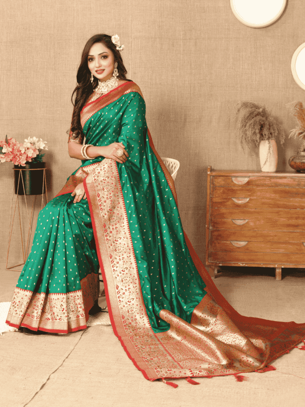 Elegant soft silk saree with detailed zari weaving, contrast pallu border, tassels at the end, and a brocade silk blouse piece, perfect for special occasions.