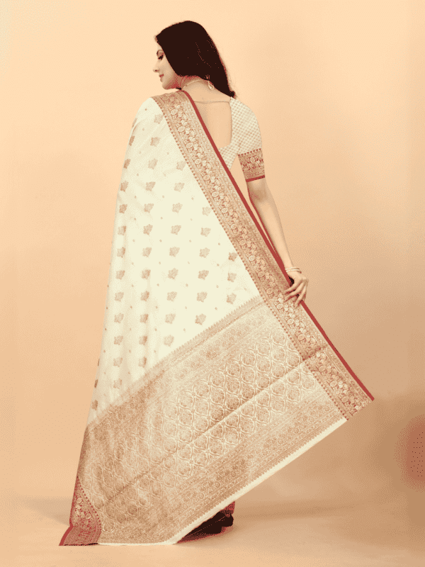 Soft magic slub silk saree with golden zari woven pallu, intricate motifs, and a designer silk weaving blouse piece.