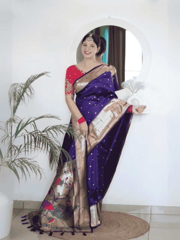 Soft Paithani silk saree with Meenakari zari weaving, tassels on the pallu, and designer silk blouse piece, ideal for festive traditional wear.