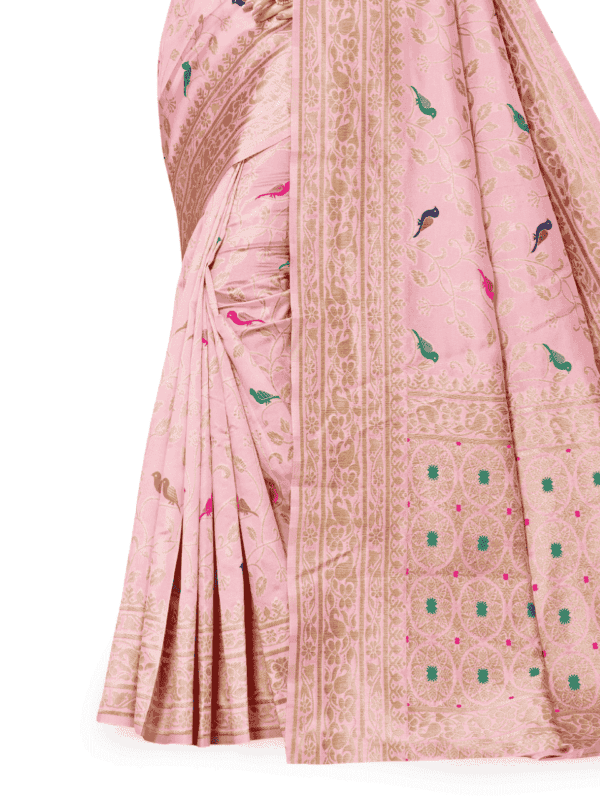 Soft Lichi silk saree features a golden zari woven pallu and border with beautiful motifs, complemented by a designer brocade silk blouse piece.