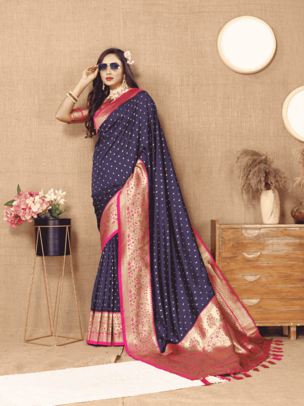 Elegant soft silk saree with detailed zari weaving, contrast pallu border, tassels at the end, and a brocade silk blouse piece, perfect for special occasions.