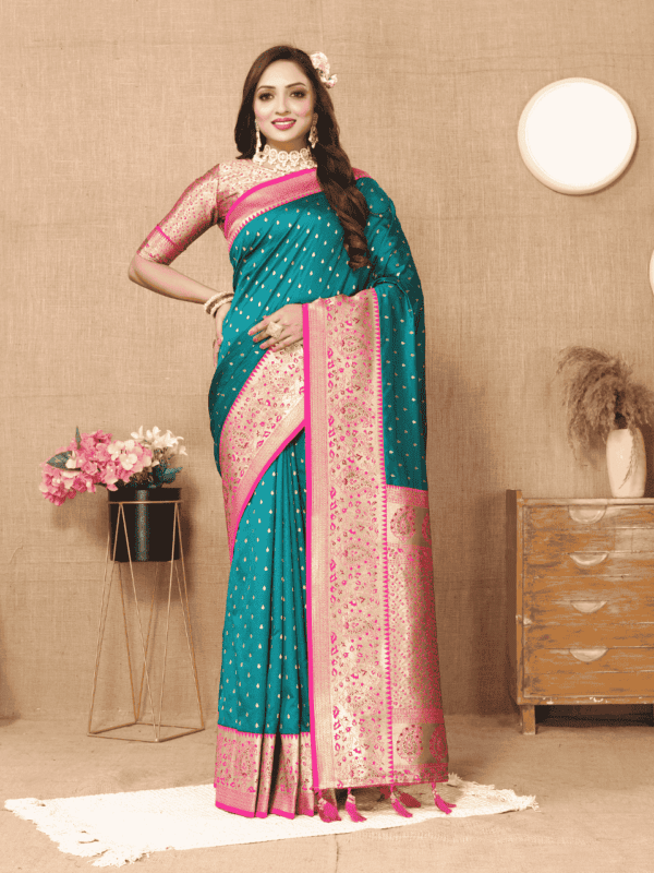 Elegant soft silk saree with detailed zari weaving, contrast pallu border, tassels at the end, and a brocade silk blouse piece, perfect for special occasions.