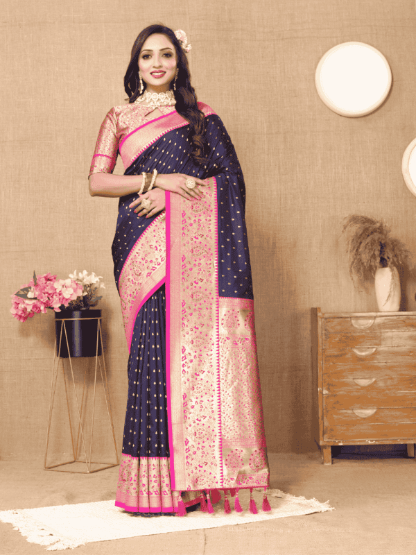 Elegant soft silk saree with detailed zari weaving, contrast pallu border, tassels at the end, and a brocade silk blouse piece, perfect for special occasions.