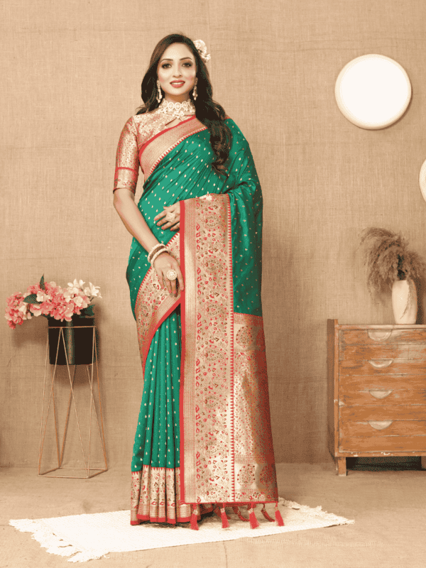 Elegant soft silk saree with detailed zari weaving, contrast pallu border, tassels at the end, and a brocade silk blouse piece, perfect for special occasions.