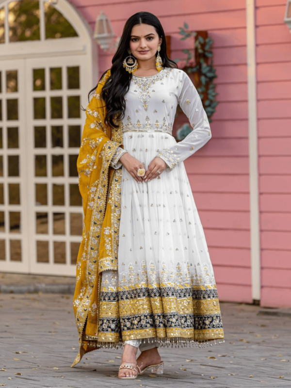 Faux georgette gown set with 5mm sequin embroidery, tassel sleeves, matching dupatta, and micro cotton bottom.