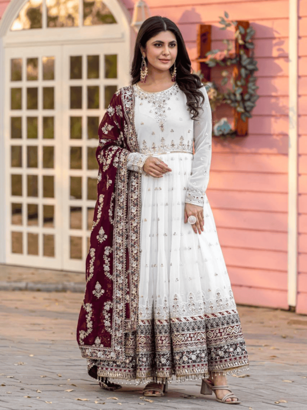 A beautifully designed faux georgette gown set with embroidery, sequin work, a matching dupatta, and a micro cotton bottom, perfect for special occasions.