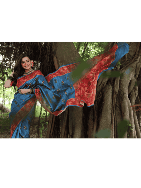 Soft Tussar Silk Saree adorned with elegant peacock prints, a traditional printed pallu, a contrast border, and a complementing contrast blouse piece.