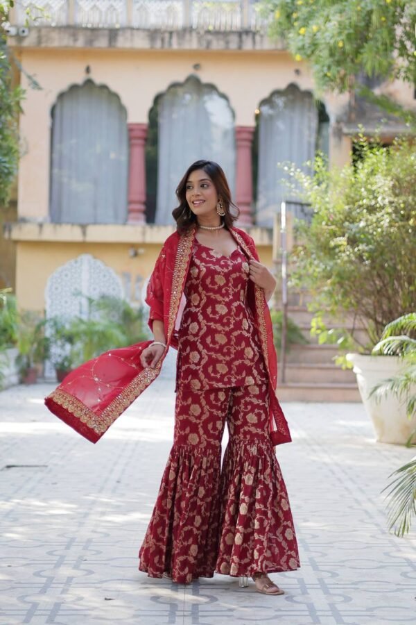 Viscose Georgette Jacquard Gharara set with a designer kurti, elastic waist gharara, and a sequined embroidered Russian silk dupatta. Available in three vibrant colors.