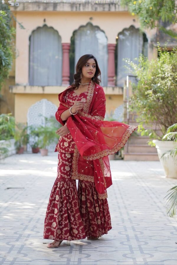 Viscose Georgette Jacquard Gharara set with a designer kurti, elastic waist gharara, and a sequined embroidered Russian silk dupatta. Available in three vibrant colors.