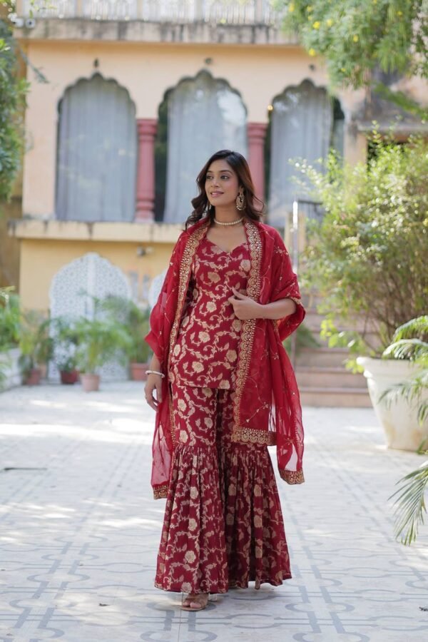 Viscose Georgette Jacquard Gharara set with a designer kurti, elastic waist gharara, and a sequined embroidered Russian silk dupatta. Available in three vibrant colors.