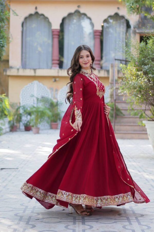 An elegant faux blooming georgette gown with rich sequins embroidery, full sleeves, a fancy V-neck, and a beautifully embroidered lace dupatta. Available in Maroon and Pink.