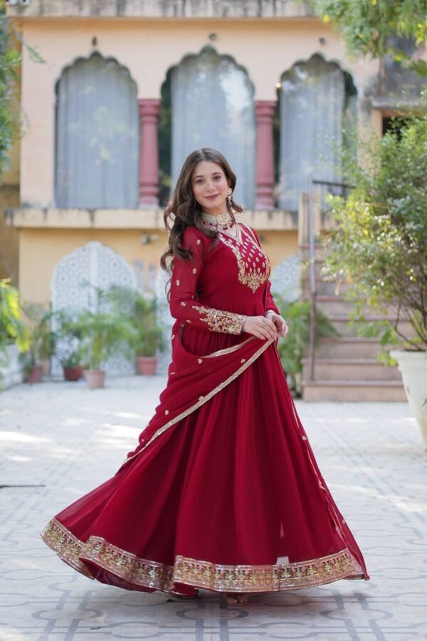 An elegant faux blooming georgette gown with rich sequins embroidery, full sleeves, a fancy V-neck, and a beautifully embroidered lace dupatta. Available in Maroon and Pink.