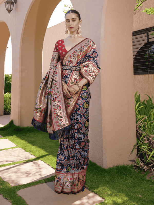 Exquisite Banarasi soft silk saree with detailed Meena and zari weaving, a Paithani-inspired border, a grand pallu, and elegant colorful lace.