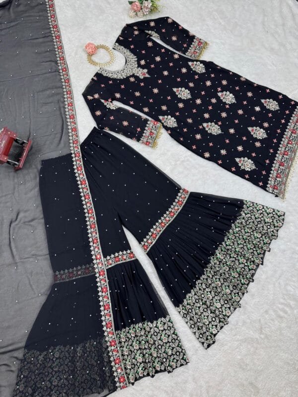 Designer faux georgette suit with thread and sequence work, featuring a matching sharara and dupatta, ideal for festive and formal events. Stylish and comfortable.