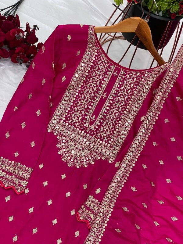 A stylish and luxurious embroidered Chinon silk top, flared sharara, and dupatta set with lace borders, ideal for festive and special occasions.