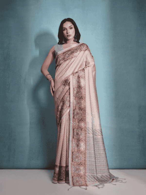 Premium cotton silk saree with a floral checks weaving pallu, Kalamkari-printed border, all-over zari woven design, and elegant fancy tassels.