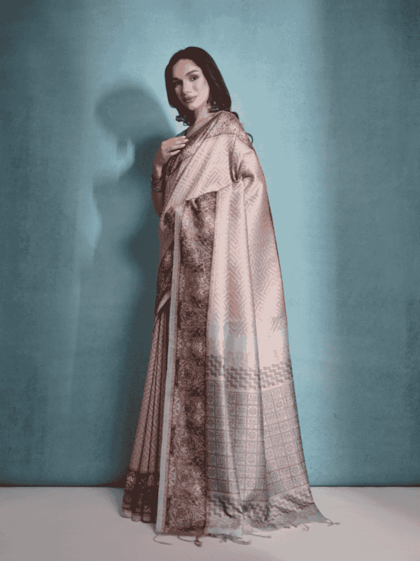 Premium cotton silk saree with a floral checks weaving pallu, Kalamkari-printed border, all-over zari woven design, and elegant fancy tassels.