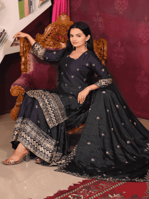 An elegant Chinon suit with intricate sequence embroidery, paired with a fully stitched sharara and a matching 2.2-meter dupatta, ideal for festive wear.