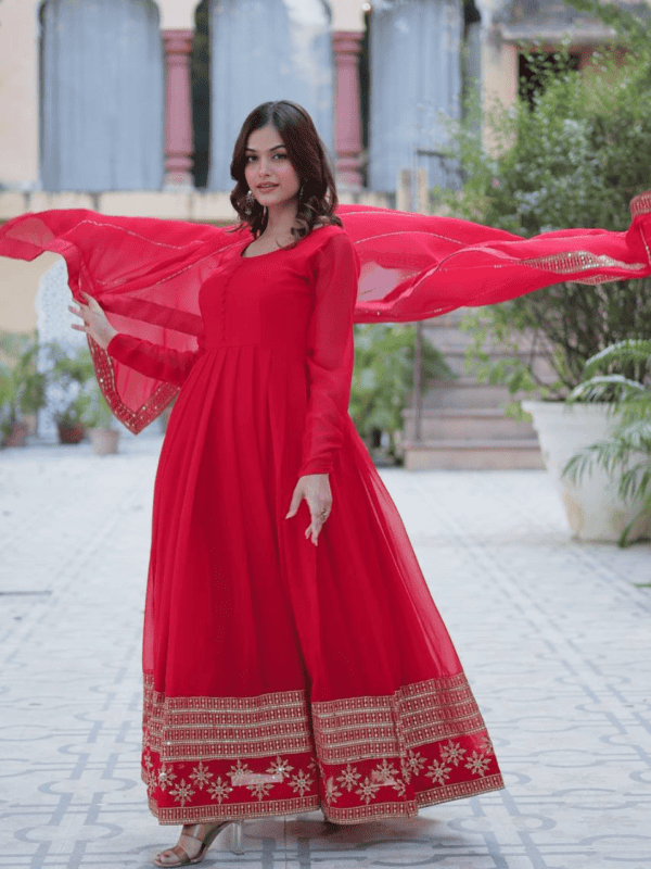 An elegant faux blooming gown with multi-sequins embroidery, full sleeves, a round neck, and a beautifully embroidered faux blooming dupatta. Available in Red, Rama, and Wine.