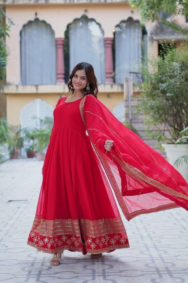 An elegant faux blooming gown with multi-sequins embroidery, full sleeves, a round neck, and a beautifully embroidered faux blooming dupatta. Available in Red, Rama, and Wine.