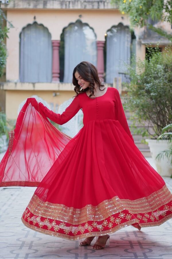 An elegant faux blooming gown with multi-sequins embroidery, full sleeves, a round neck, and a beautifully embroidered faux blooming dupatta. Available in Red, Rama, and Wine.