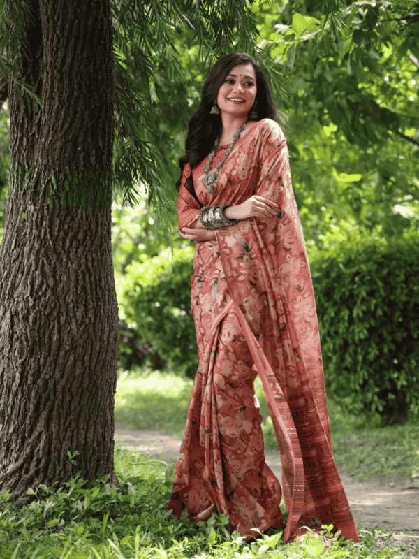 Soft Desi Tussar Silk Saree with a hand-printed pattern, a delicate zari border, a printed pallu with tassels, and a complementing running blouse piece.