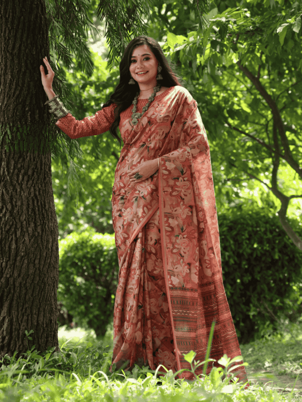 Soft Desi Tussar Silk Saree with a hand-printed pattern, a delicate zari border, a printed pallu with tassels, and a complementing running blouse piece.